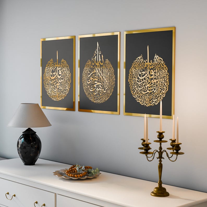 Quranic Grace Set black and gold featuring Ayatul Kursi, Surah Al-Falaq, and Surah An-Nas wall art on living room wall
